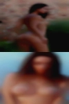 Nudist woman swinging